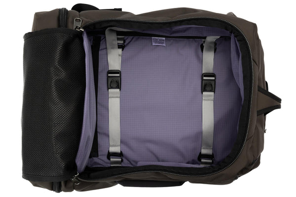 An open Techonaut 45 with a Ursa (brown) exterior and a Dusk (purplish-blue) interior.
